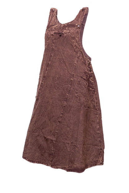 These 100% cotton, stonewashed pinafore dress is a classic design in an everyday styles that work anywhere and is very comfortable and stylish. It features 2 deep pockets and are a regular fit and comfortable to the body. They are very versatile, functional, and comfortable to wear. This lightweight breathable and comfortable pinafore dress with soft fabric can be layered with leggings and long sleeve tops for extra warmth. Available in Green, Orange, Black, Brown